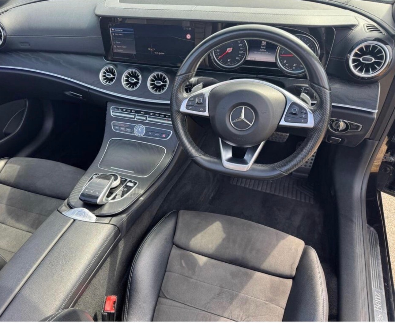 Mercedes-Benz E-Class dashboard, steering wheel and front seats